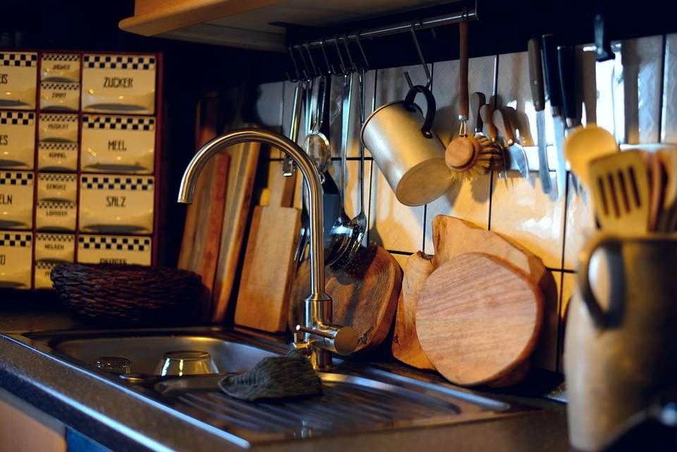 a pet safe kitchen with utensils and sink displayed